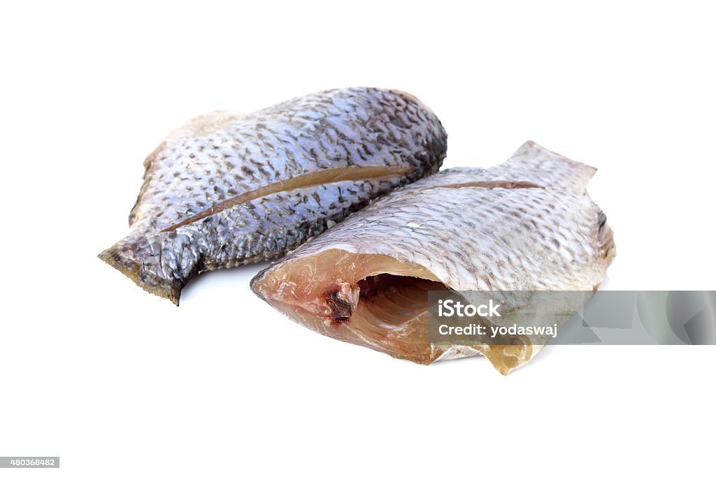 dried Tilapia one sun on white background 2015 Stock Photo