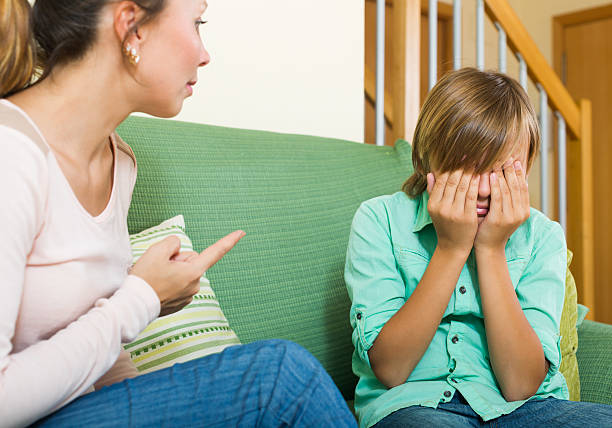 istock ordinary mother berating teenager son 480369940