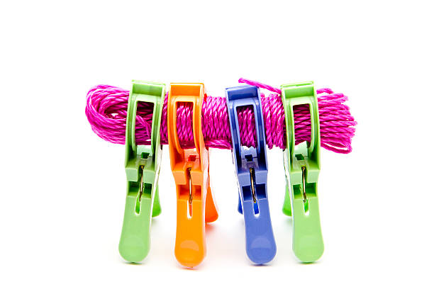 istock Clothesline with Clothespins on white background 480370635