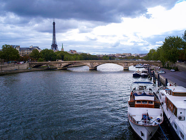 istock Eiffel Tower on the bank of river seine 480371371