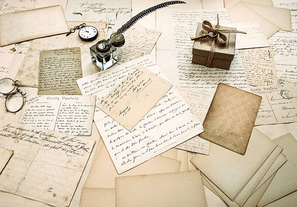 istock old letters, vintage postcards and antique feather pen 480377919