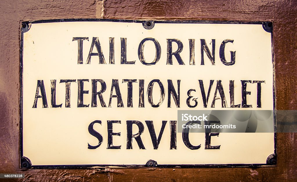 Vintage Tailor Sign In London A Vintage Sign For A Tailor And Valet In London England Change Stock Photo