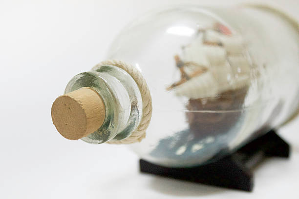 istock Close Up of Glass Bottle with Ship in it 480379274