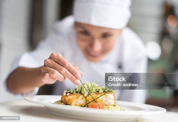 Cook Decorating A Plate Stock Photo - Download Image Now - Chef, Gourmet, Restaurant