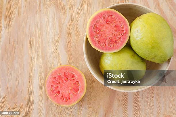 Fresh Goiaba On Wooden Table Stock Photo - Download Image Now - Guava, Fruit, 2015