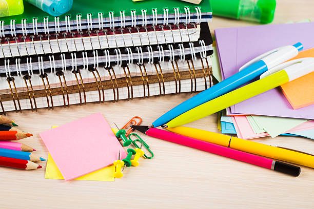 istock School and office accessories on wooden background 480381362