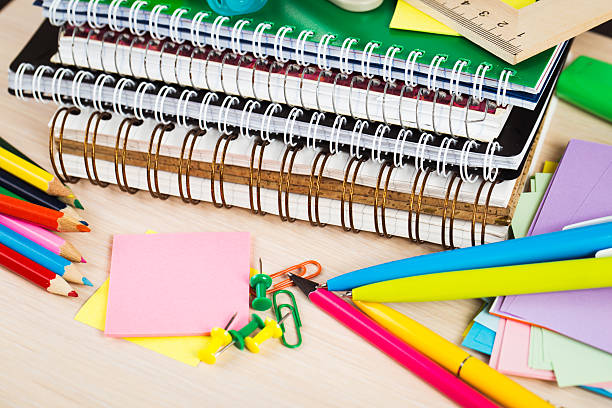 istock School and office accessories on wooden background 480381364