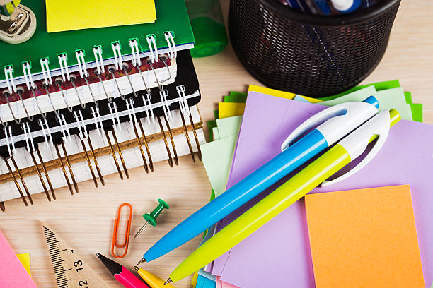 istock School and office accessories on wooden background 480381598