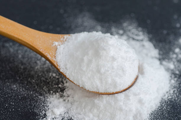 istock Sodium bicarbonate in a wooden spoon 480384951