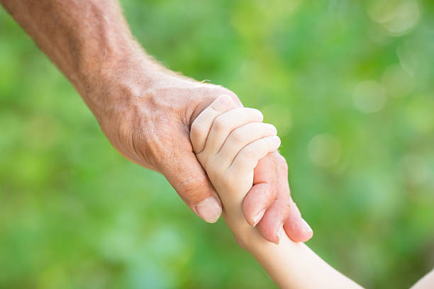 istock Senior man and baby 480385245