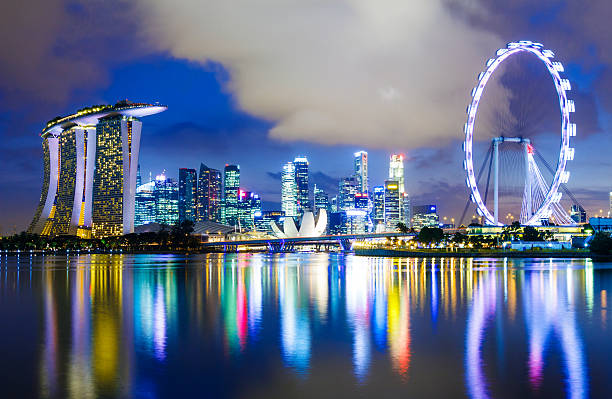 istock Singapore skyline at night 480386915