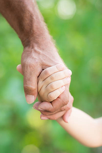 istock Senior man and baby 480387163