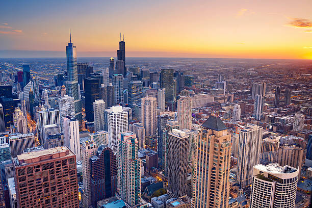 Chicago. Aerial view of Chicago downtown at twilight from high above. michigan avenue chicago stock pictures, royalty-free photos & images