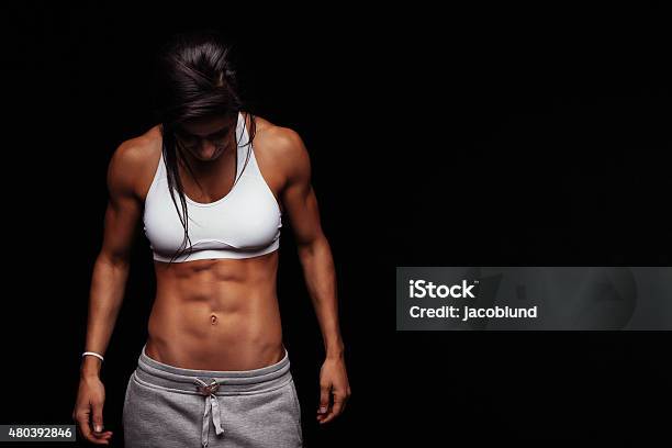 Young Female With Perfect Muscular Body Stock Photo - Download Image Now - Women, Body Building, Only Women