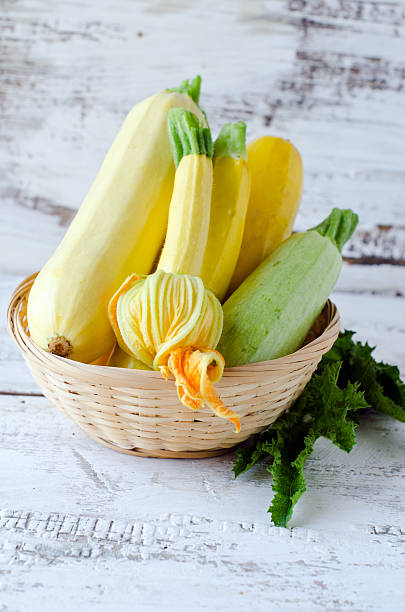 istock Fresh zucchini on a wooden white table 480395619