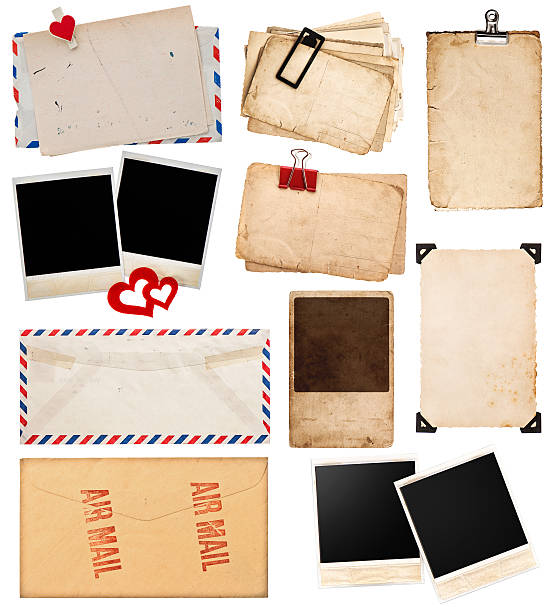 istock vintage papers, postcards and photo frames isolated on white 480396897