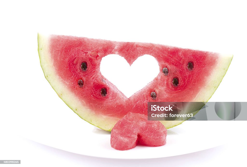 Watermelon with heart isolated on white background Close-up Stock Photo