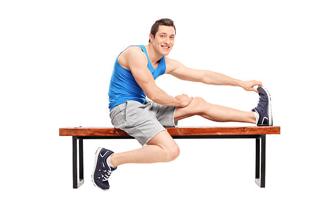 istock Young male athlete stretching his leg 480400866