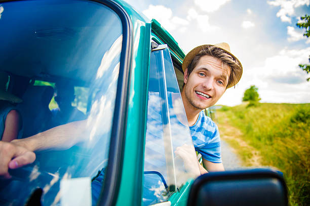 istock Young hipster friends on road trip 480404066