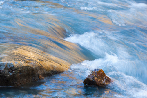 Stones in the flowing river