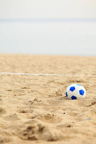istock football gate and ball, beach soccer 480406217
