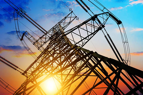 high voltage post. high voltage post.High-voltage tower sky background. industry stock pictures, royalty-free photos & images