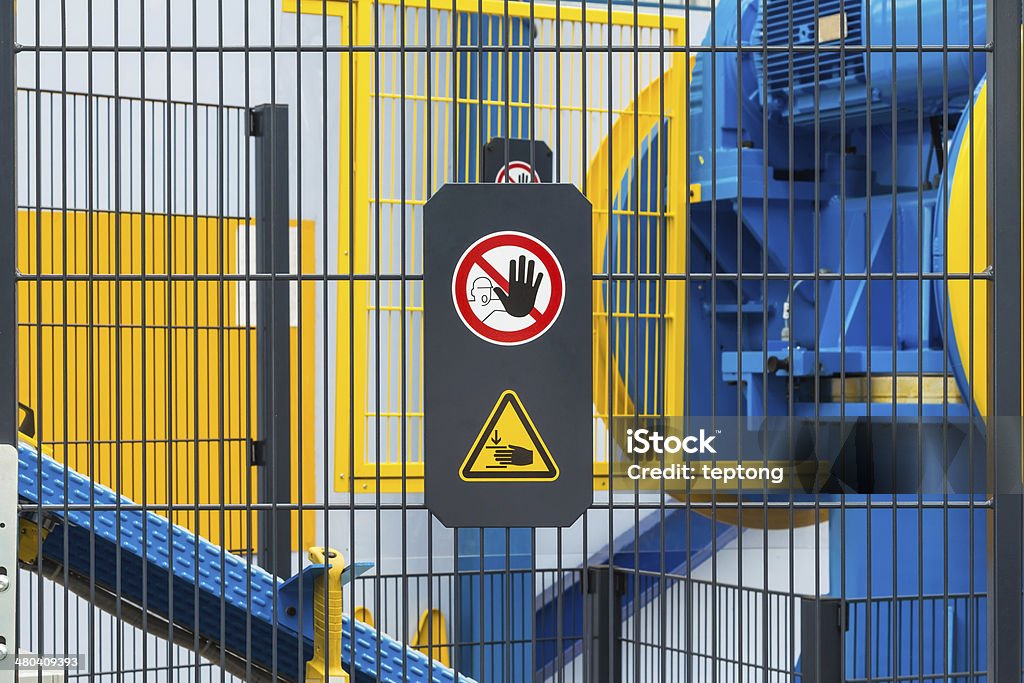 Safety sign Warning sign for safety on machine, no entry and be careful of hand Machinery Stock Photo