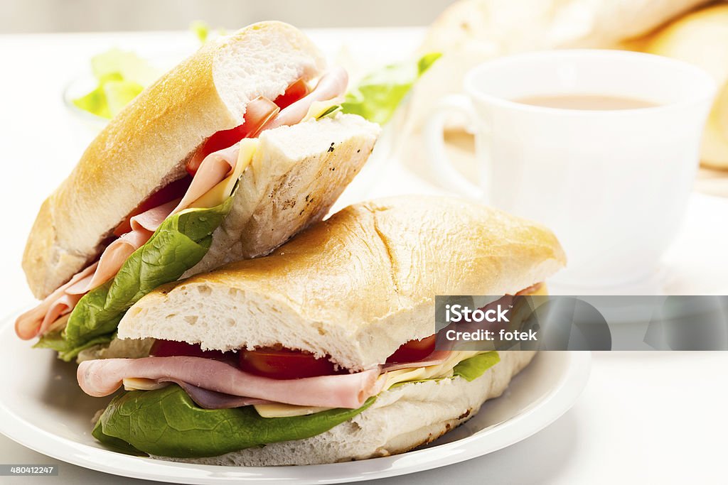 Italian panini sandwich Italian panini sandwich with ham, cheese and tomato Bread Stock Photo