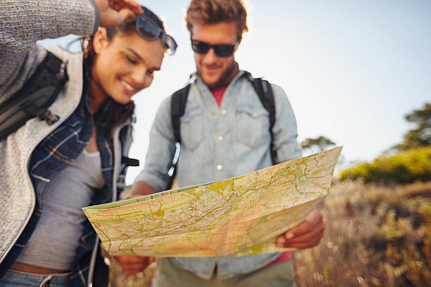 istock Couple reading map on country walk 480415146