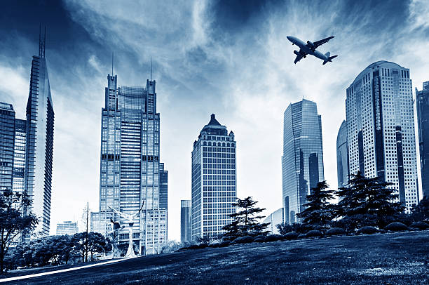 istock Shanghai's skyscrapers and airplanes on sky 480420283