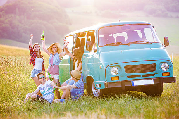 istock Young hipster friends on road trip 480423286