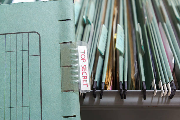 istock File folders in a filing cabinet 480427022