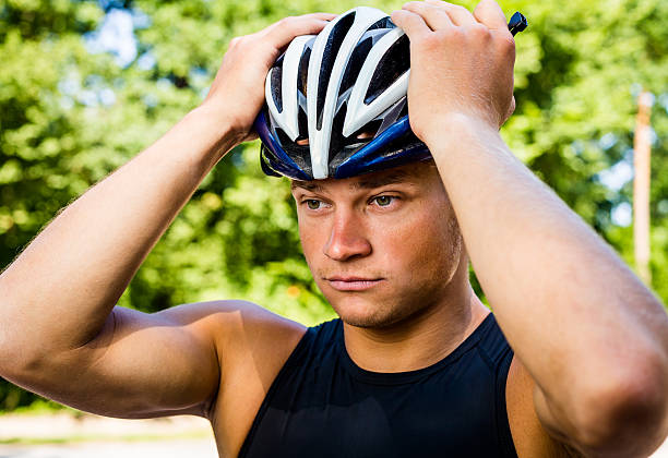 istock Professional cyclists wear a helmet for his safety 480429094