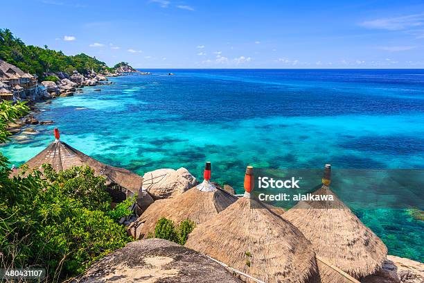 Bamboo Hut Over Crystal Clear Sea Stock Photo - Download Image Now - Architecture, Bamboo Shoot, Beach