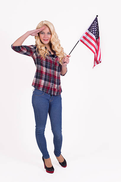 istock American girl with u.s. flag 480434759