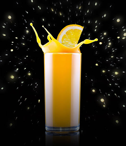 istock Fresh orange juice in glass with splash 480437039