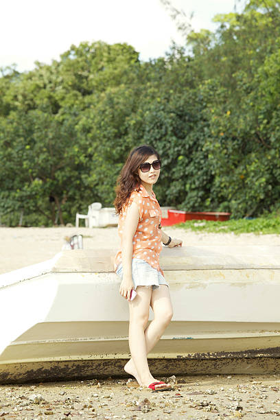 istock Young asian woman in summer 480437225