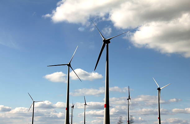 istock The Alternative energy. Group of energy-producing windmills 480439915