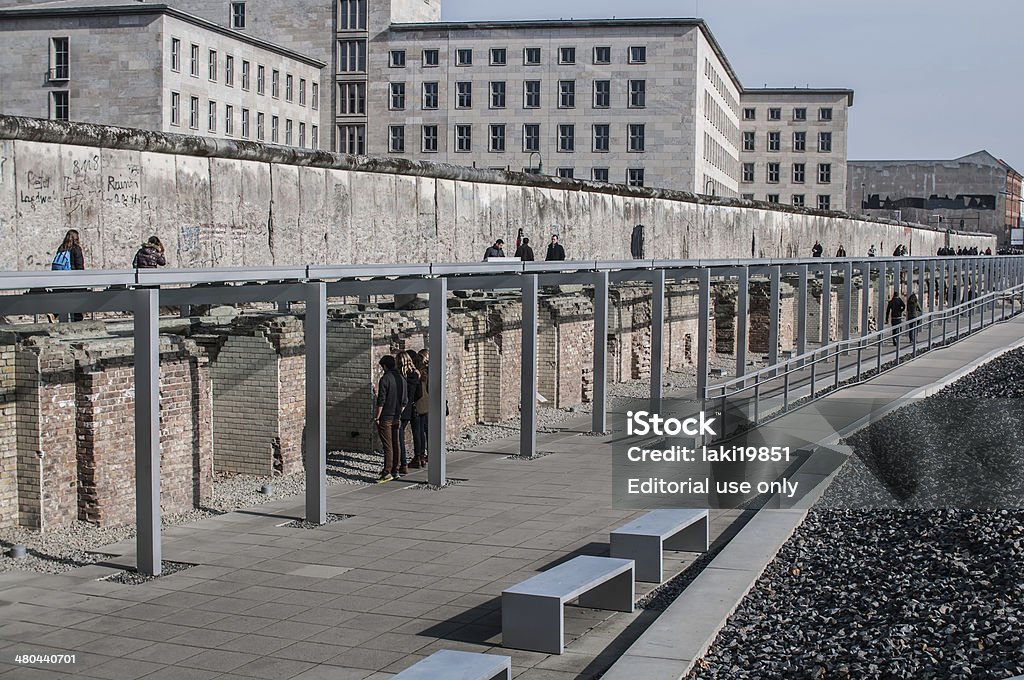 Topography of Terror museum, Berlin, Germany Berlin, Germany - March 1, 2014: Museum of the topography of terror in Berlin. Located on Niederkirchnerstrasse, the site of buildings which during the Nazi Germany from 1933 to 1945, were the main headquarters of the Gestapo and the SS, the main tool of repression. On the picture, people museum visitors. Adolf Hitler Stock Photo