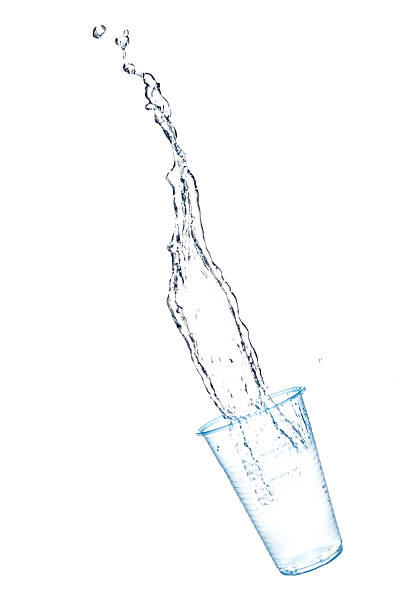 istock Plastic glass and water in the air 480446401