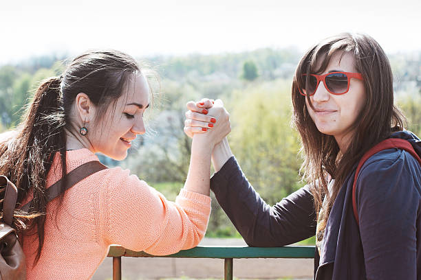 istock Girls engaged in arm wrestling 480447536