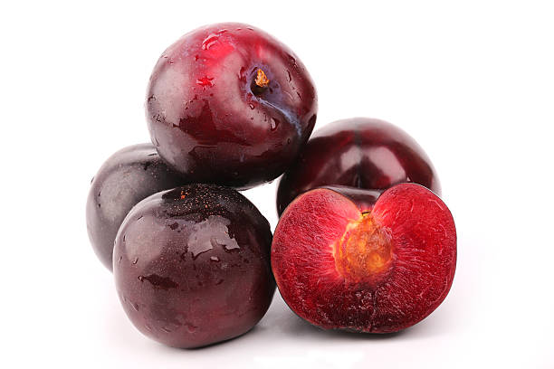 istock plum isolated on a white background juicy ripe red 480451632