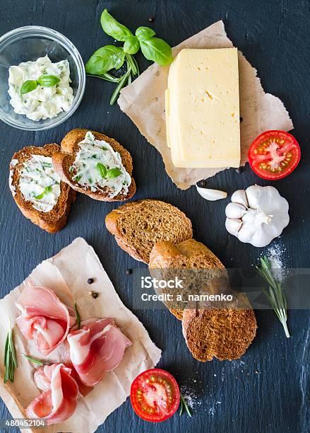 Sandwich Ingredients Baguette Meat Cheese Butter Basil Tomato Garlic Stock Photo - Download Image Now