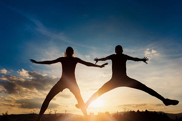 istock Young runners in canola field 480452164