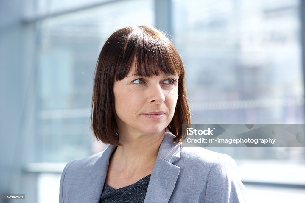 Modern business woman Close up portrait of a modern business woman Side View Stock Photo