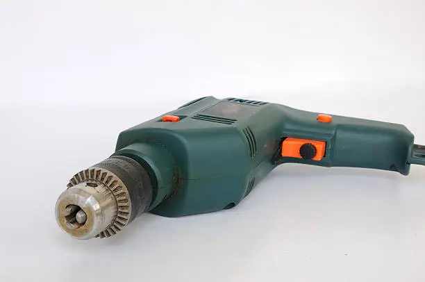Electric drill disconnected with drill-bit.