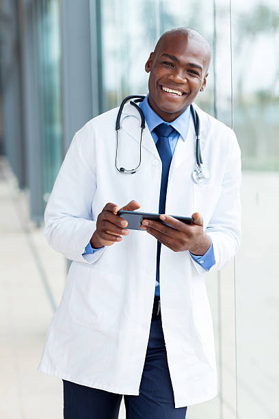 istock african american medical doctor using tablet pc 480454279