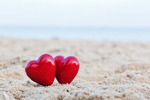 istock Two red hearts symbolizing love, Valentine's Day, romantic couple 480454519