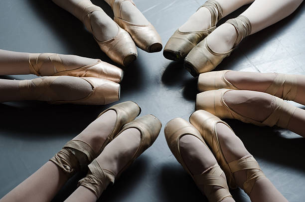 girls ballet training studio lightning pointe shoes six girls on training repetition in ballet class wearing pointe shoes making circle figure ballet photos stock pictures, royalty-free photos & images