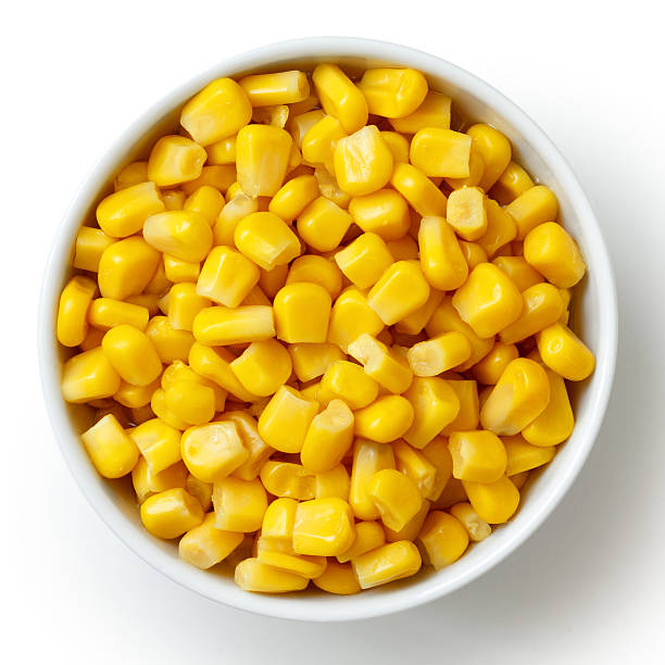 istock Bowl of tinned sweetcorn isolated from above on white. 480458218